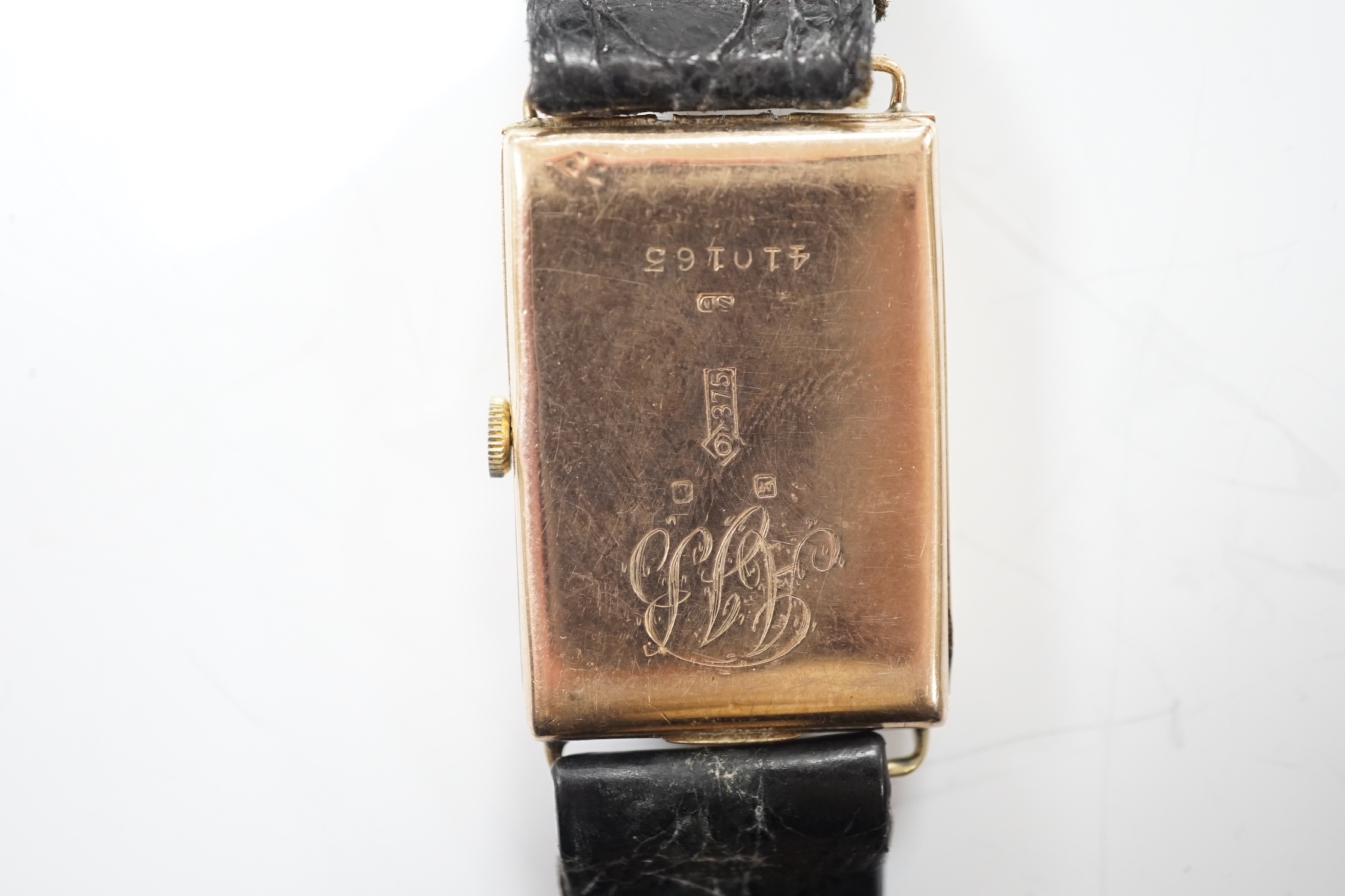 A gentleman's 1930's 9ct gold Cortebert manual wind rectangular dial wrist watch, on a leather strap.